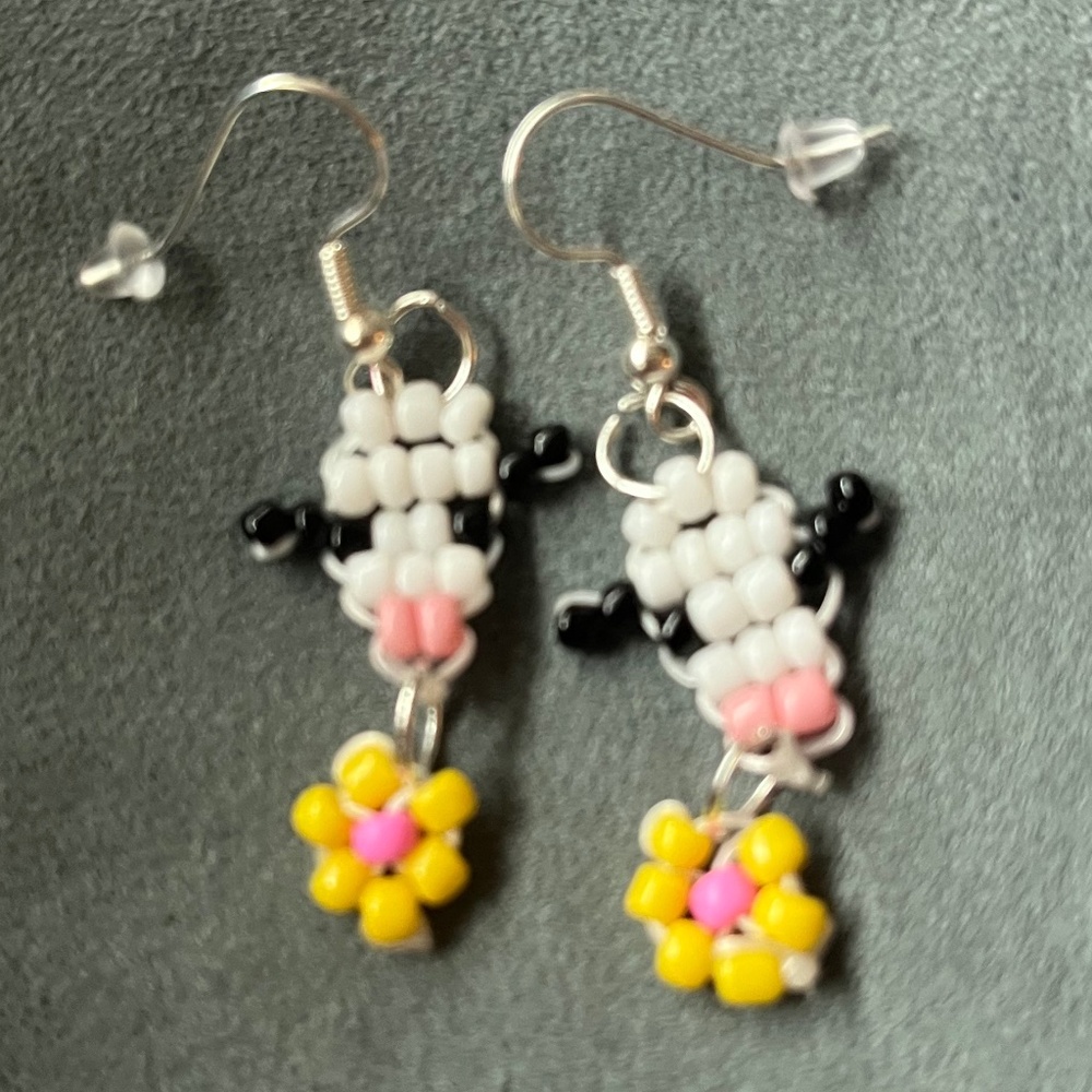 Cute cow earrings all sizes durable and stretchy really cute and fun